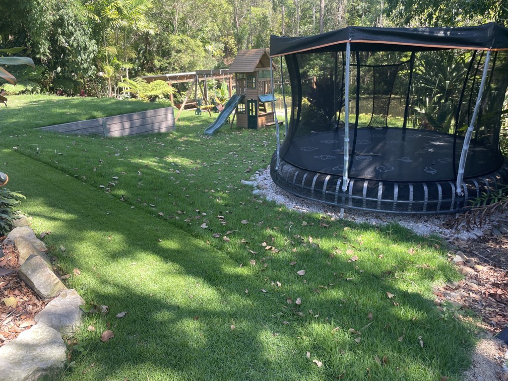 After lawn tidy around trampoline with cleaner finish